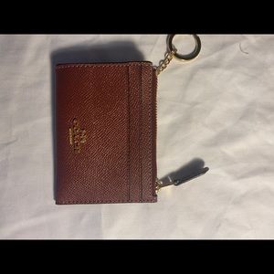 Coach mini wallet.